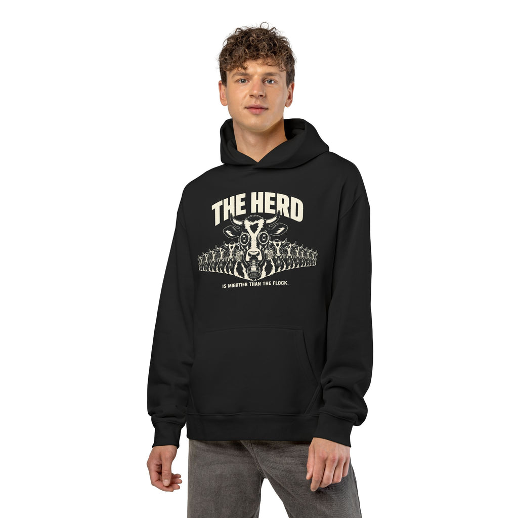 Man wearing the Stampede Hoodie in black, front: gas-mask cow stampede, THE HERD