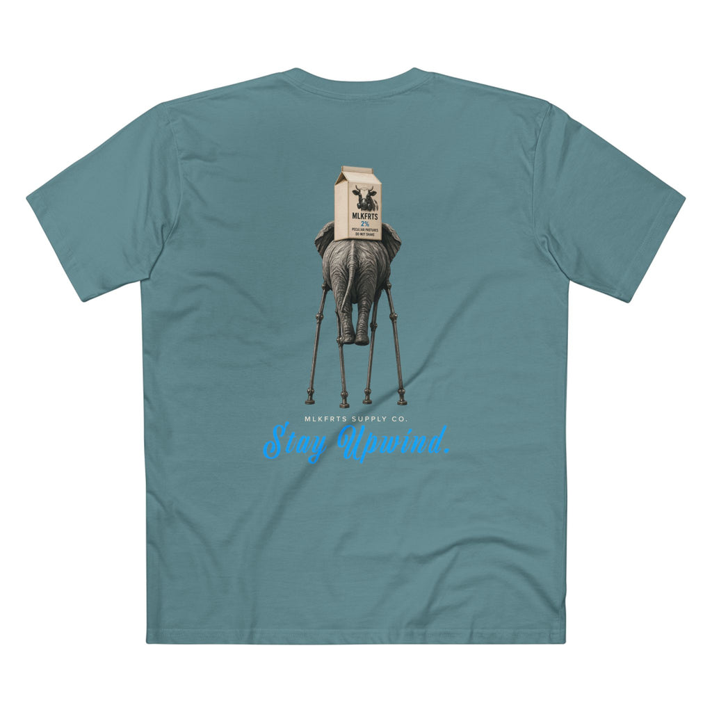 Stay Upwind Tee in slate blue, back: elephant on stilt legs carrying an MLKFRTS 2% milk carton, blue script Stay Upwind