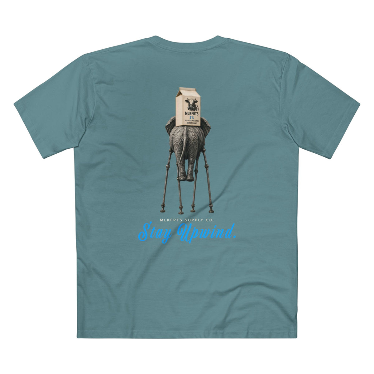 Stay Upwind Tee in slate blue, back: elephant on stilt legs carrying an MLKFRTS 2% milk carton, blue script Stay Upwind