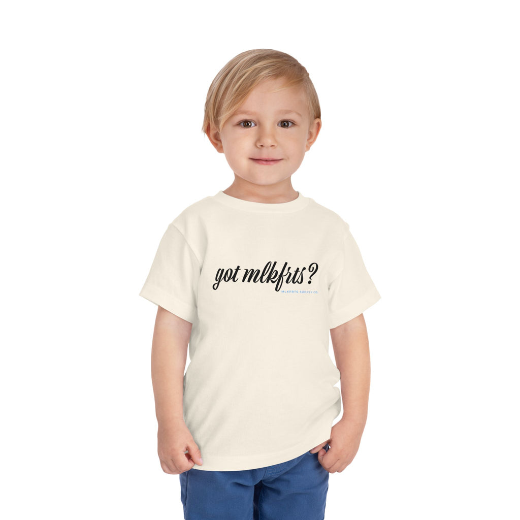 Toddler wearing the got mlkfrts? Toddler Tee in Natural, got mlkfrts? script on the front
