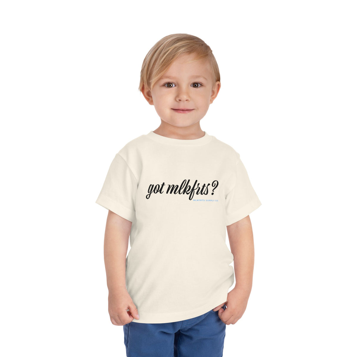 Toddler wearing the got mlkfrts? Toddler Tee in Natural, got mlkfrts? script on the front