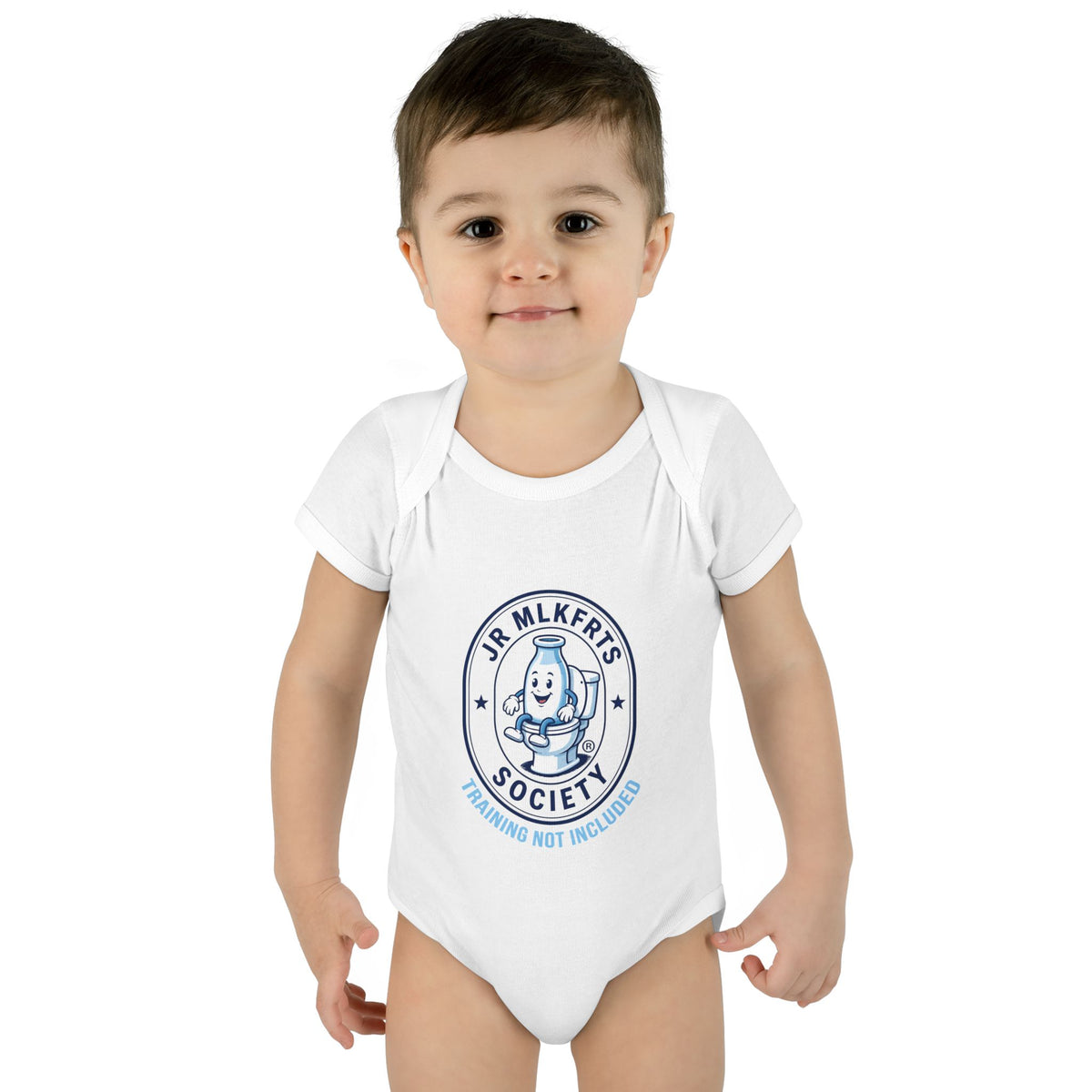 Baby wearing the White baby bodysuit with a round Jr. MLKFRTS Society badge print with a cartoon milk bottle
