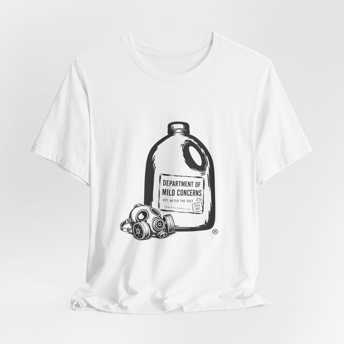 White t-shirt laid flat with a large gallon milk jug graphic with a gas mask and "Department of Mild Concerns" label