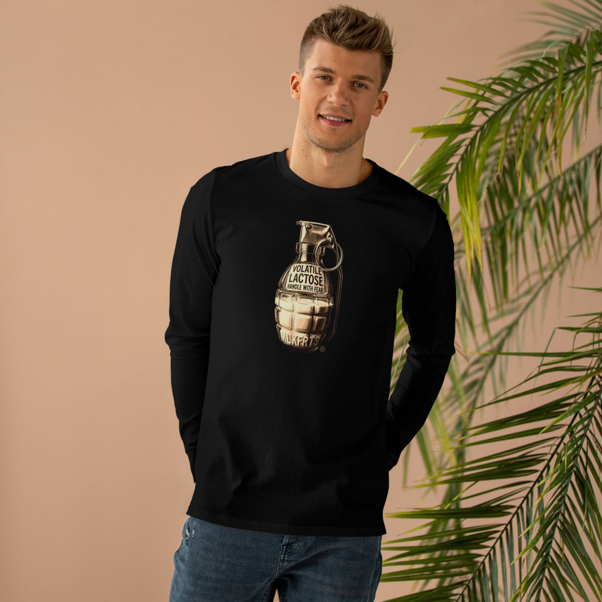 MLKFRTS Volatile Lactose Long Sleeve Tee in black, model wearing it, front view showing the Volatile Lactose grenade graphic