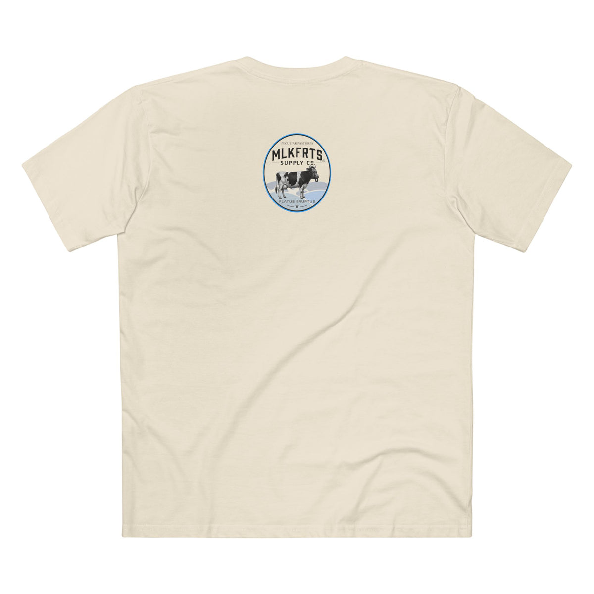 The Refusal Tee in Natural, back: small Flatus Eruptus badge on the upper back, a gas-mask Holstein on blue hills with a star