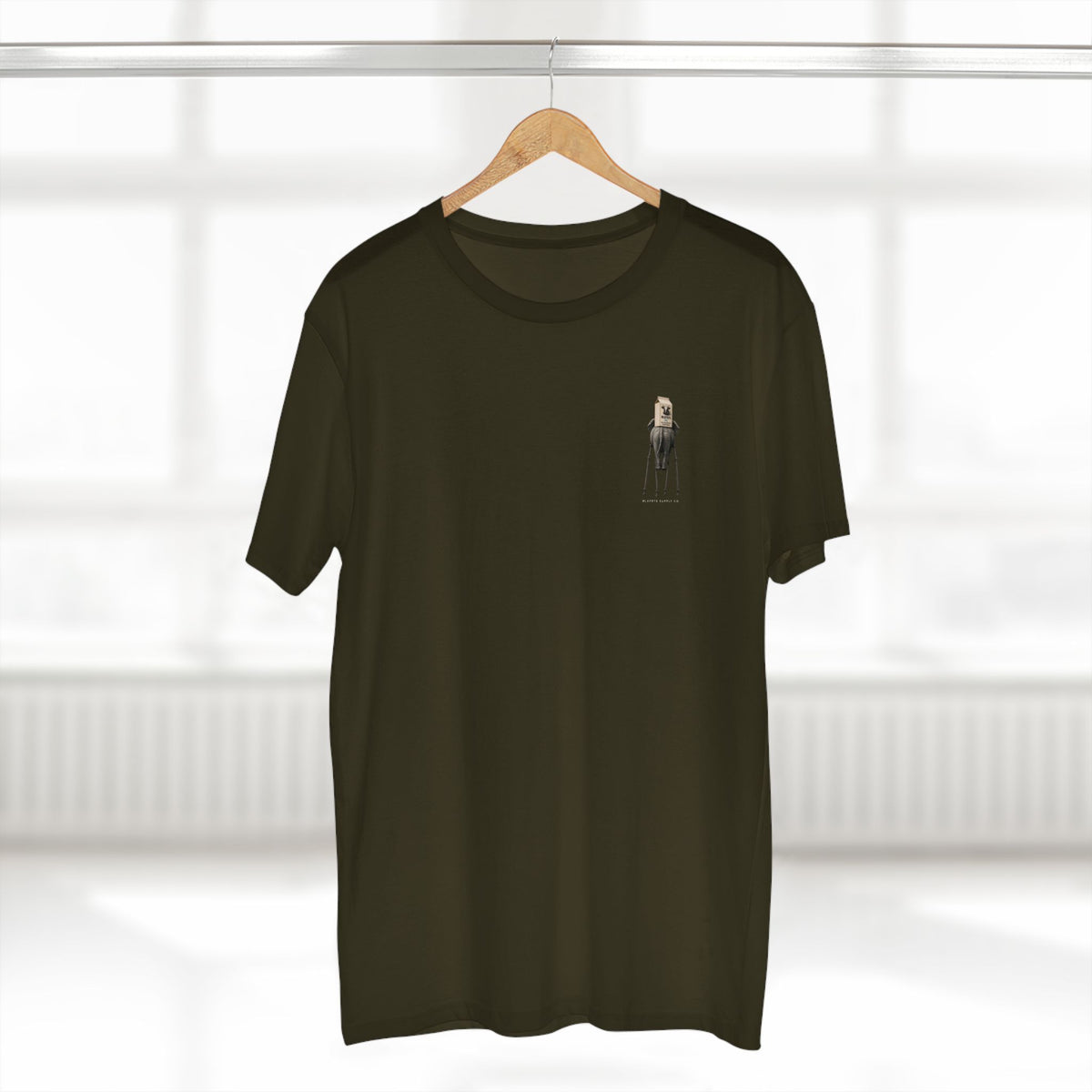 Stay Upwind Tee in army on a hanger, front: small left-chest elephant
