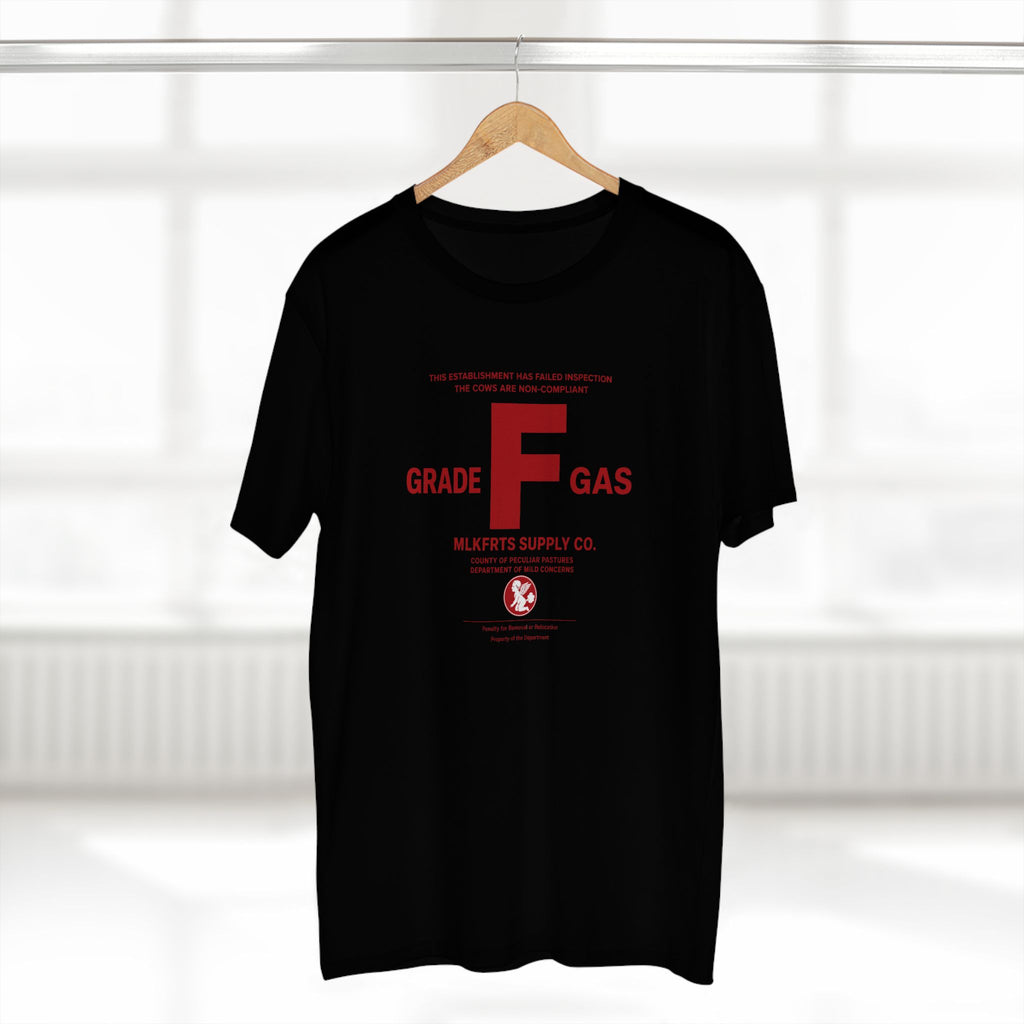MLKFRTS Grade F Notice of Non-Compliance tee in Black on a hanger, front view with the red Grade F notice of non-compliance