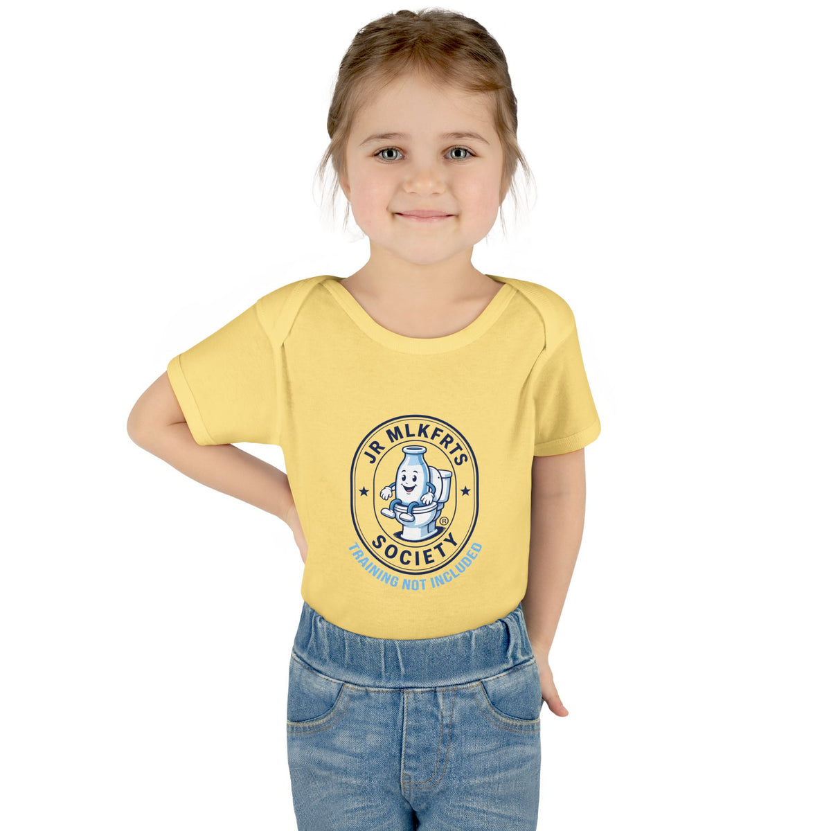 Baby wearing the Banana baby bodysuit with a round Jr. MLKFRTS Society badge print with a cartoon milk bottle