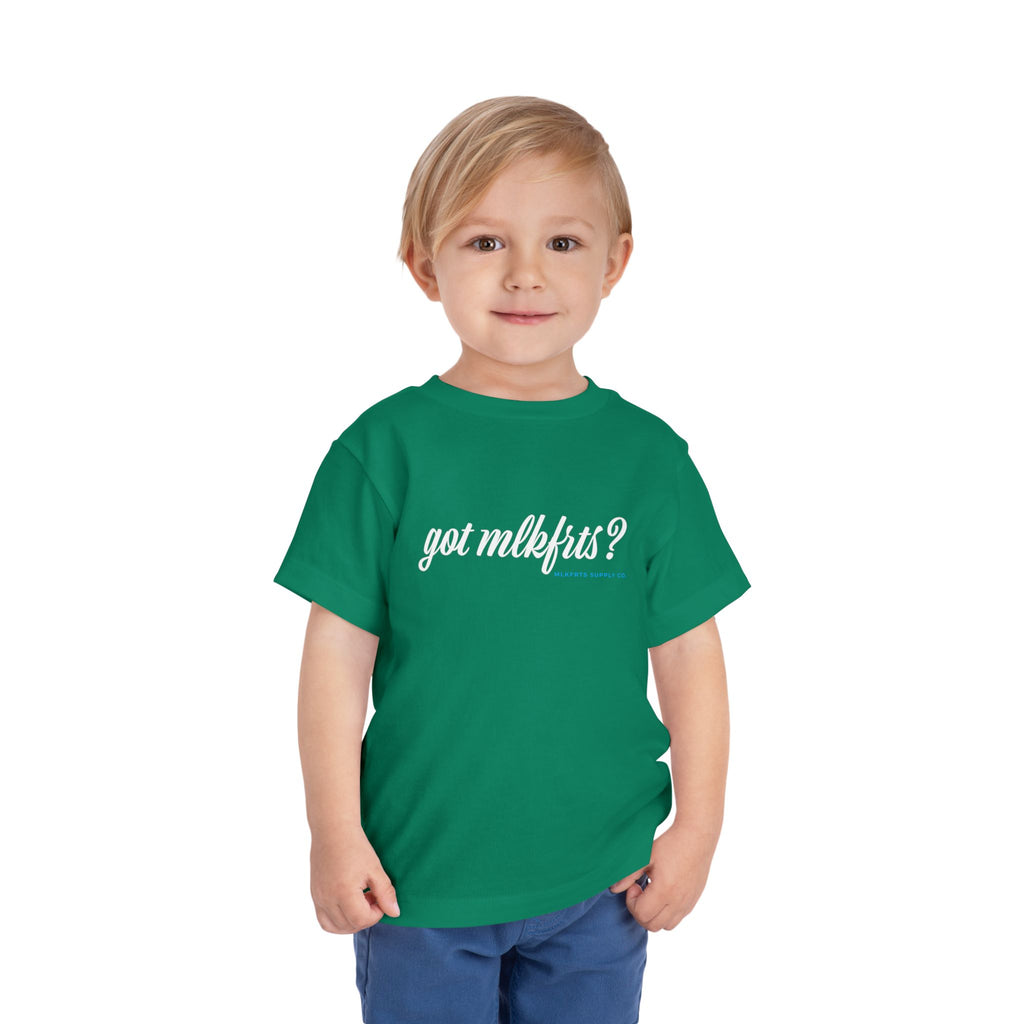 Toddler wearing the got mlkfrts? Toddler Tee in Kelly, got mlkfrts? script on the front