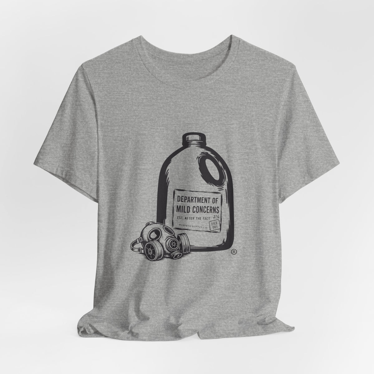 Athletic Heather t-shirt laid flat with a large gallon milk jug graphic with a gas mask and "Department of Mild Concerns" label