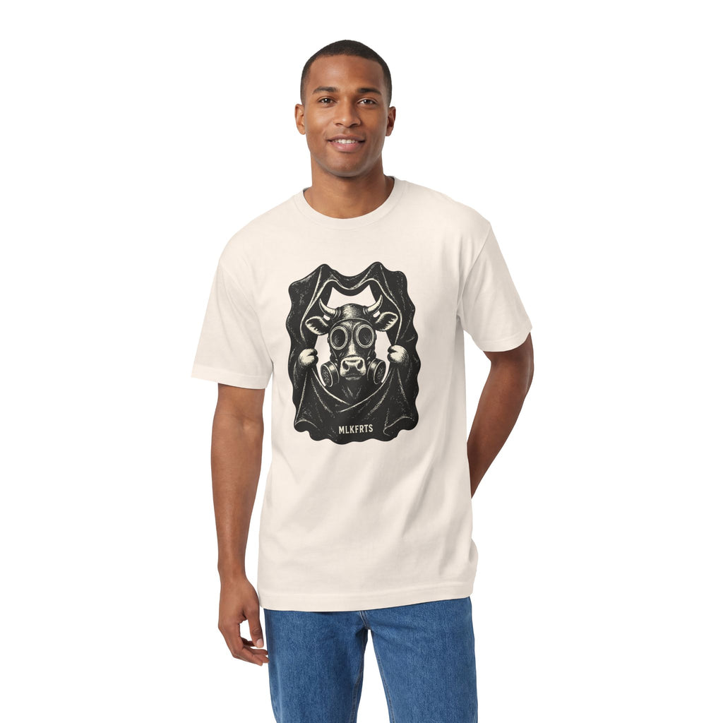 Model wearing the Cream t-shirt with a woodcut-style Holstein cow wearing a gas mask, front view