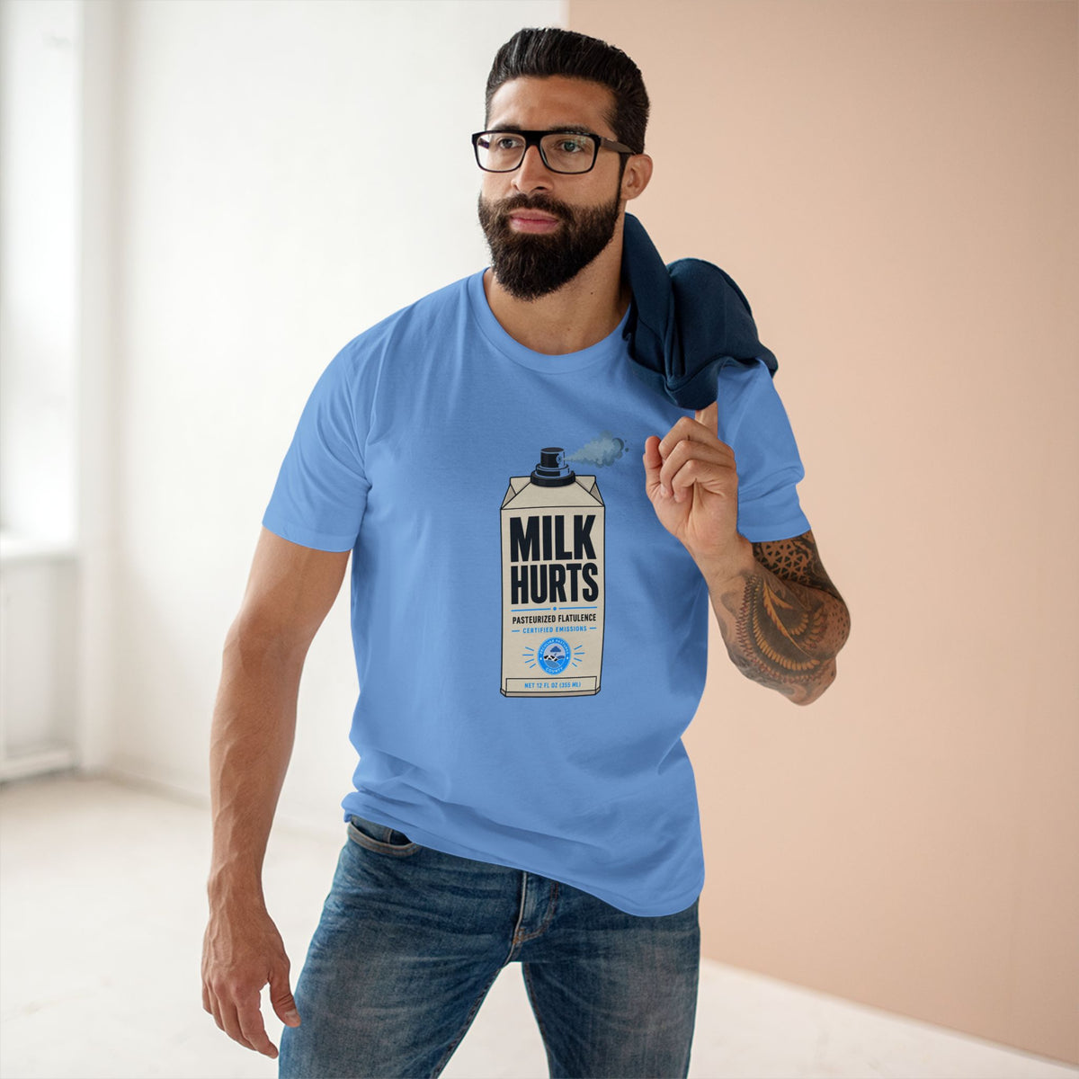 MLKFRTS Milk Hurts Mace Tee in Carolina blue, model wearing it, front view showing the Milk Hurts milk carton graphic