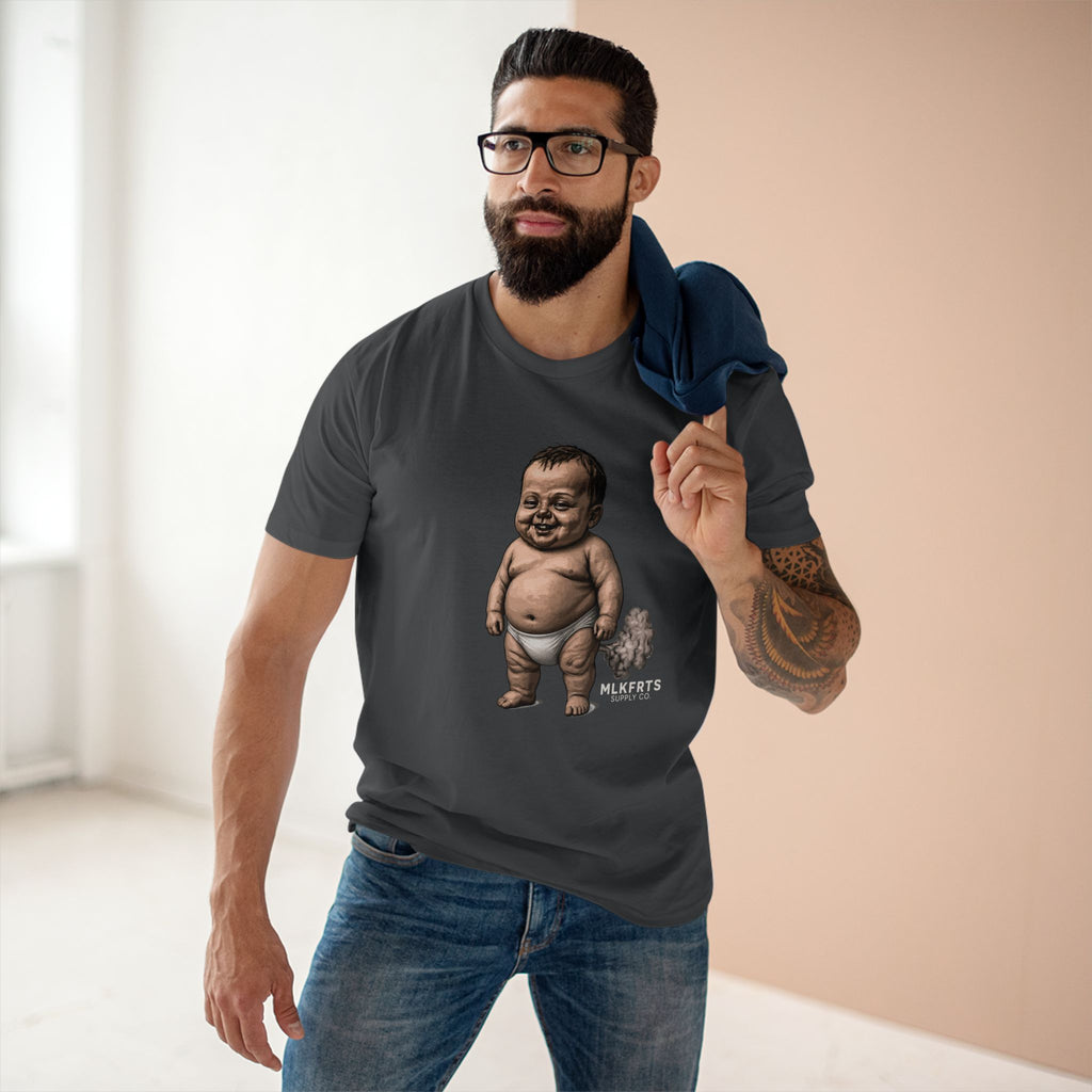 Man wearing the charcoal MLKFRTS Lil' Stinker Tee, smug diaper baby with gas cloud on the front