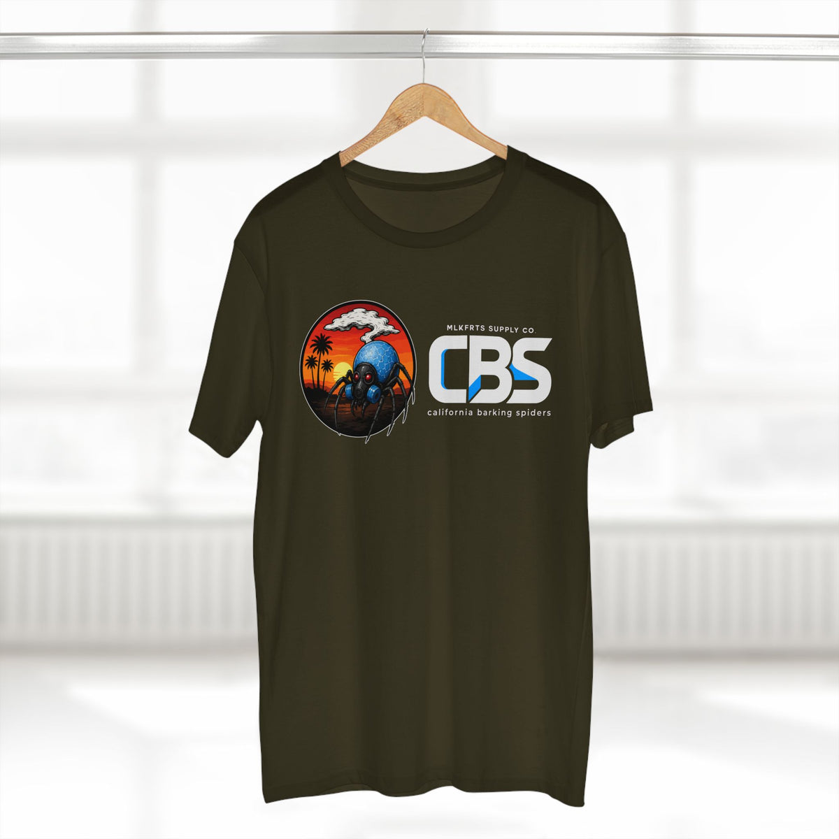 MLKFRTS California Barking Spiders Tee in army on a hanger, front: CBS lockup with the gas-masked spider
