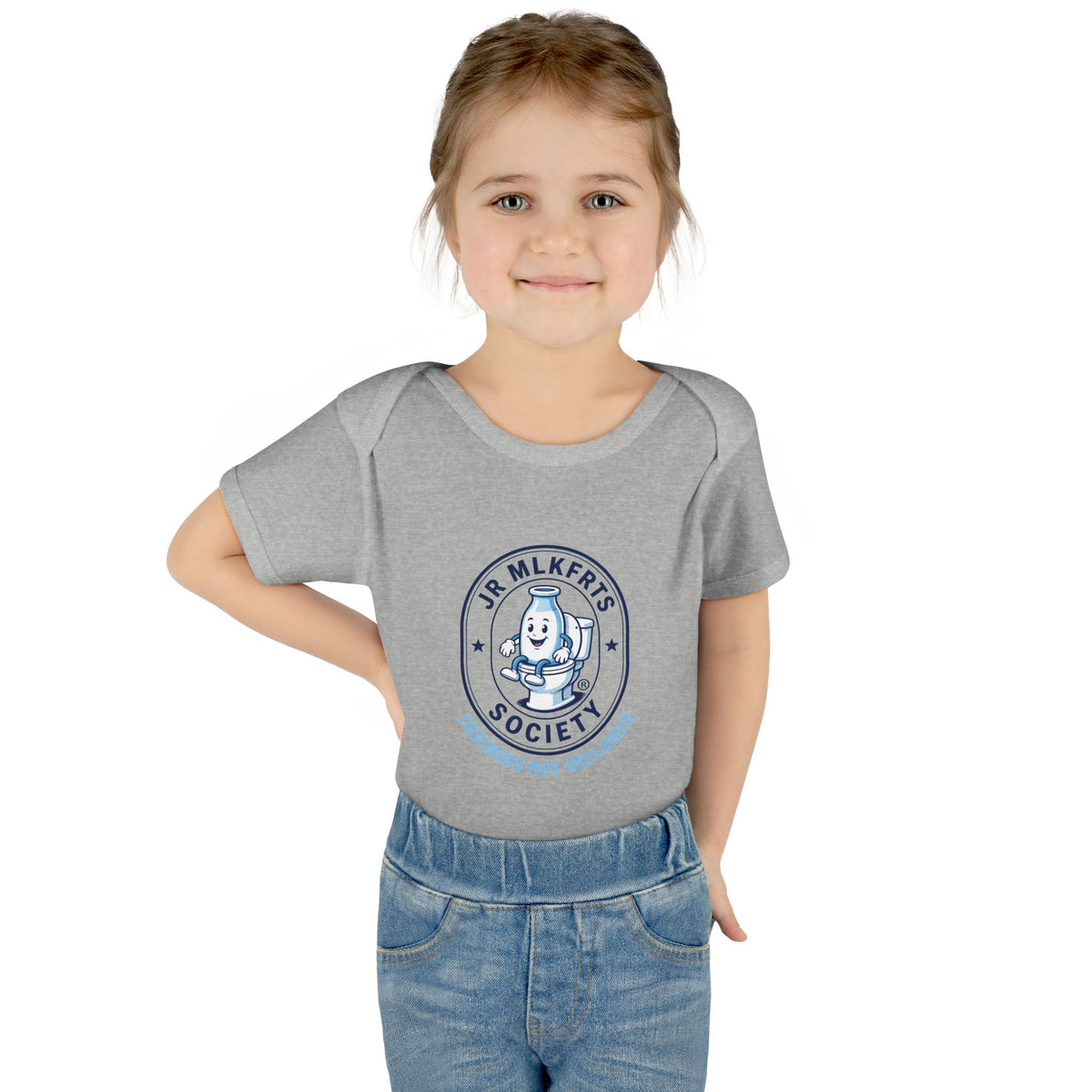 Baby wearing the Heather baby bodysuit with a round Jr. MLKFRTS Society badge print with a cartoon milk bottle