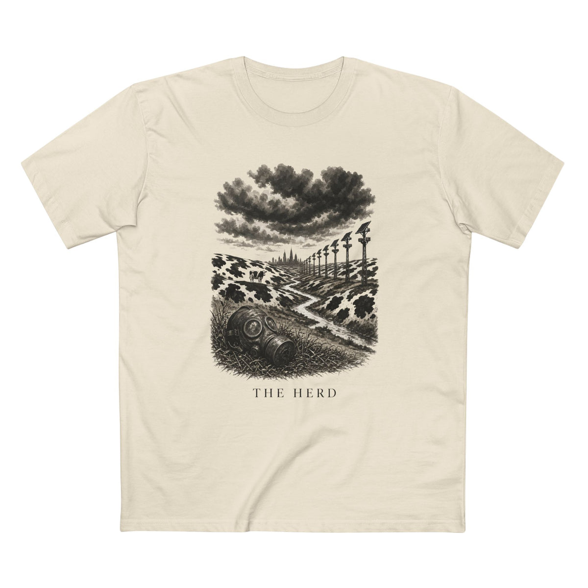 The Hills Have Cams Tee in natural, front: etched surveillance poles over Holstein hills with a lone cow and a gas mask in the grass, THE HERD.