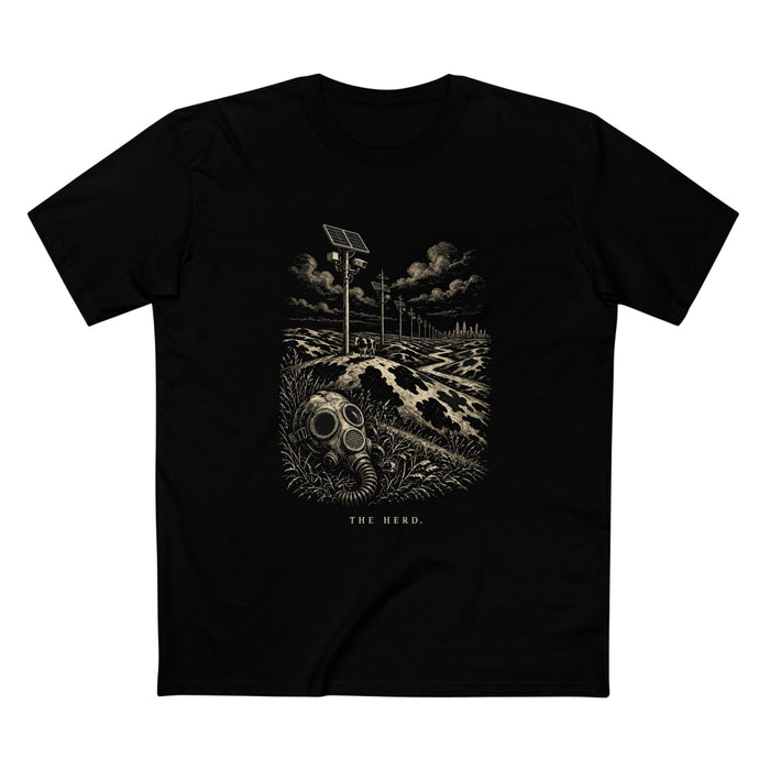 The Hills Have Cams Tee in black, front: etched surveillance poles over Holstein hills with a lone cow and a gas mask in the grass, THE HERD.