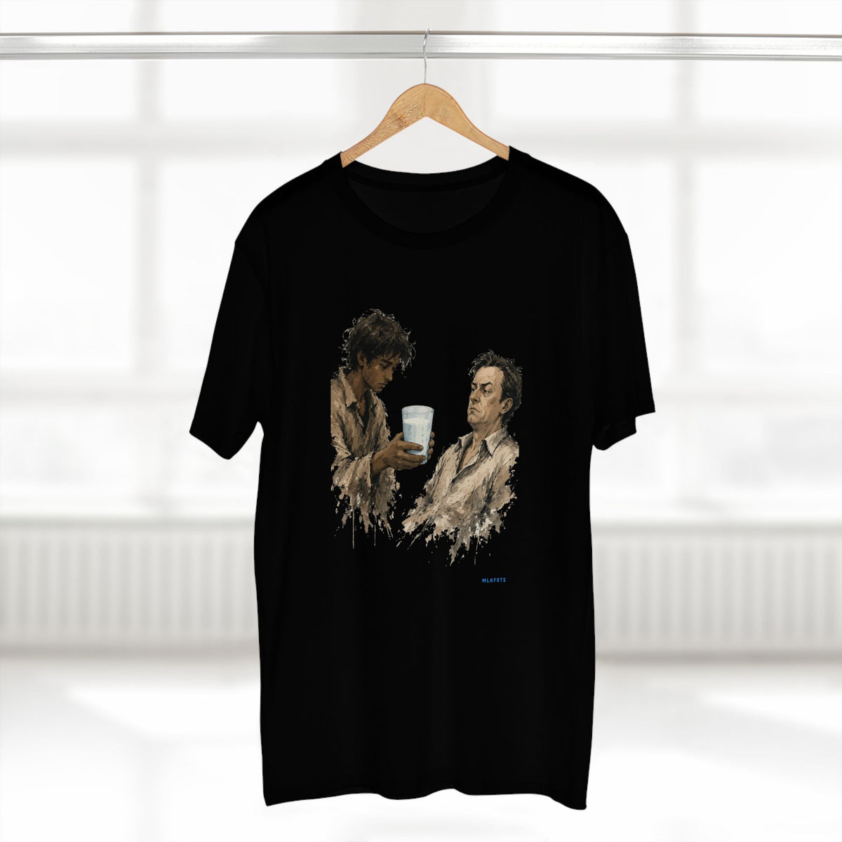 The Refusal Tee in Black on a hanger, close-up of the painterly front art