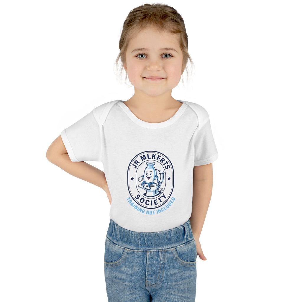 Baby wearing the White baby bodysuit with a round Jr. MLKFRTS Society badge print with a cartoon milk bottle