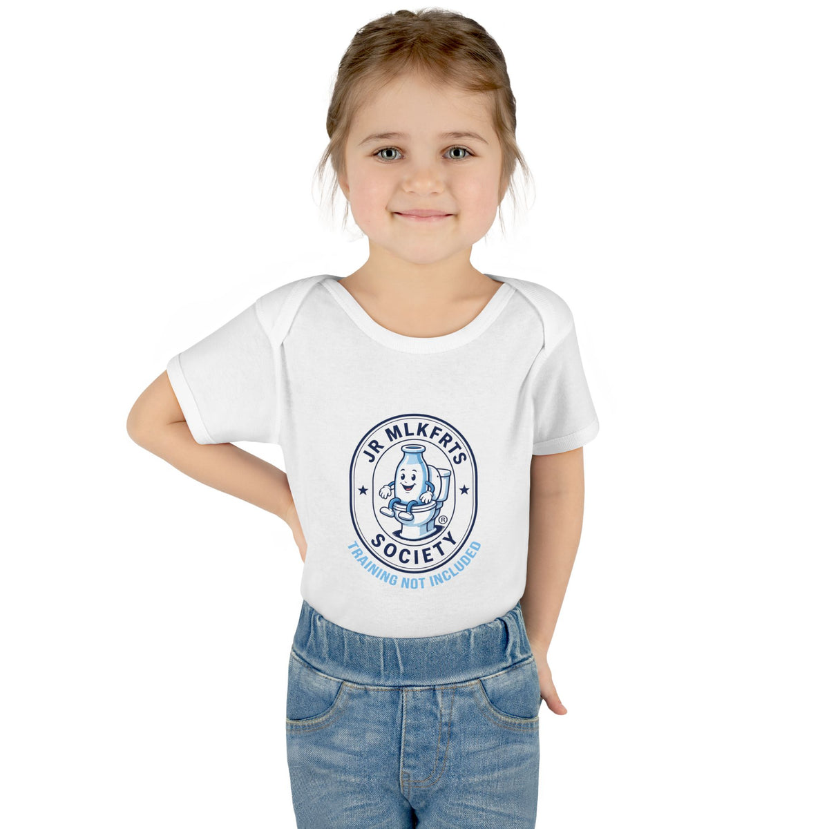 Baby wearing the White baby bodysuit with a round Jr. MLKFRTS Society badge print with a cartoon milk bottle