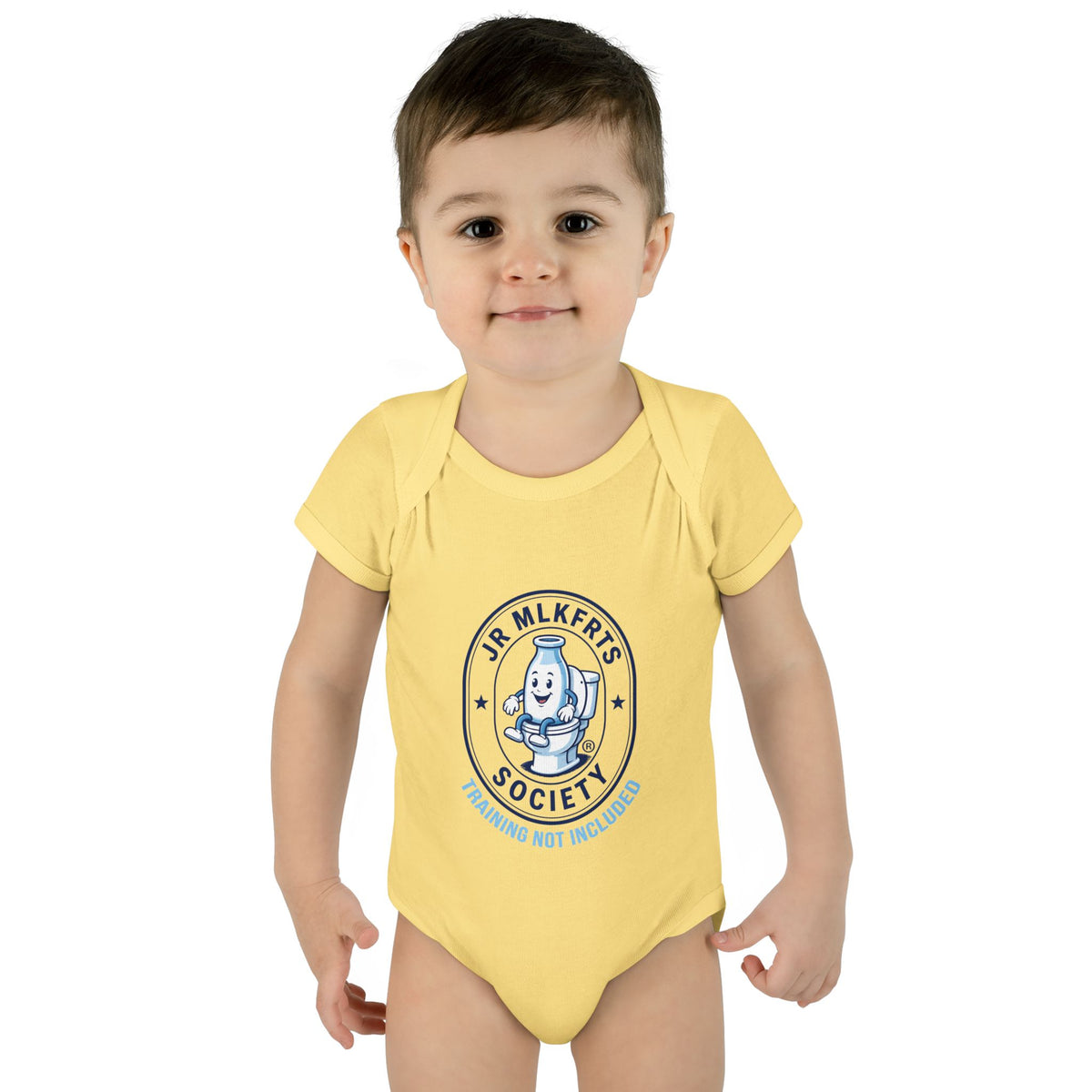 Baby wearing the Banana baby bodysuit with a round Jr. MLKFRTS Society badge print with a cartoon milk bottle