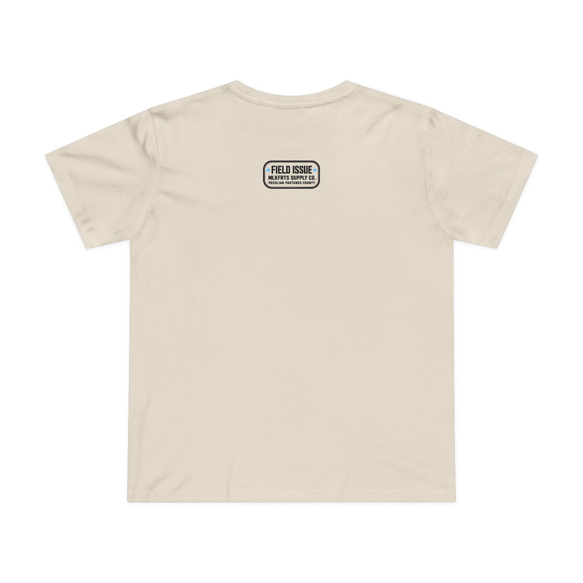 Ecru women's tee with the Field Issue patch reading MLKFRTS Supply Co., Peculiar Pastures County, on the upper back, back view