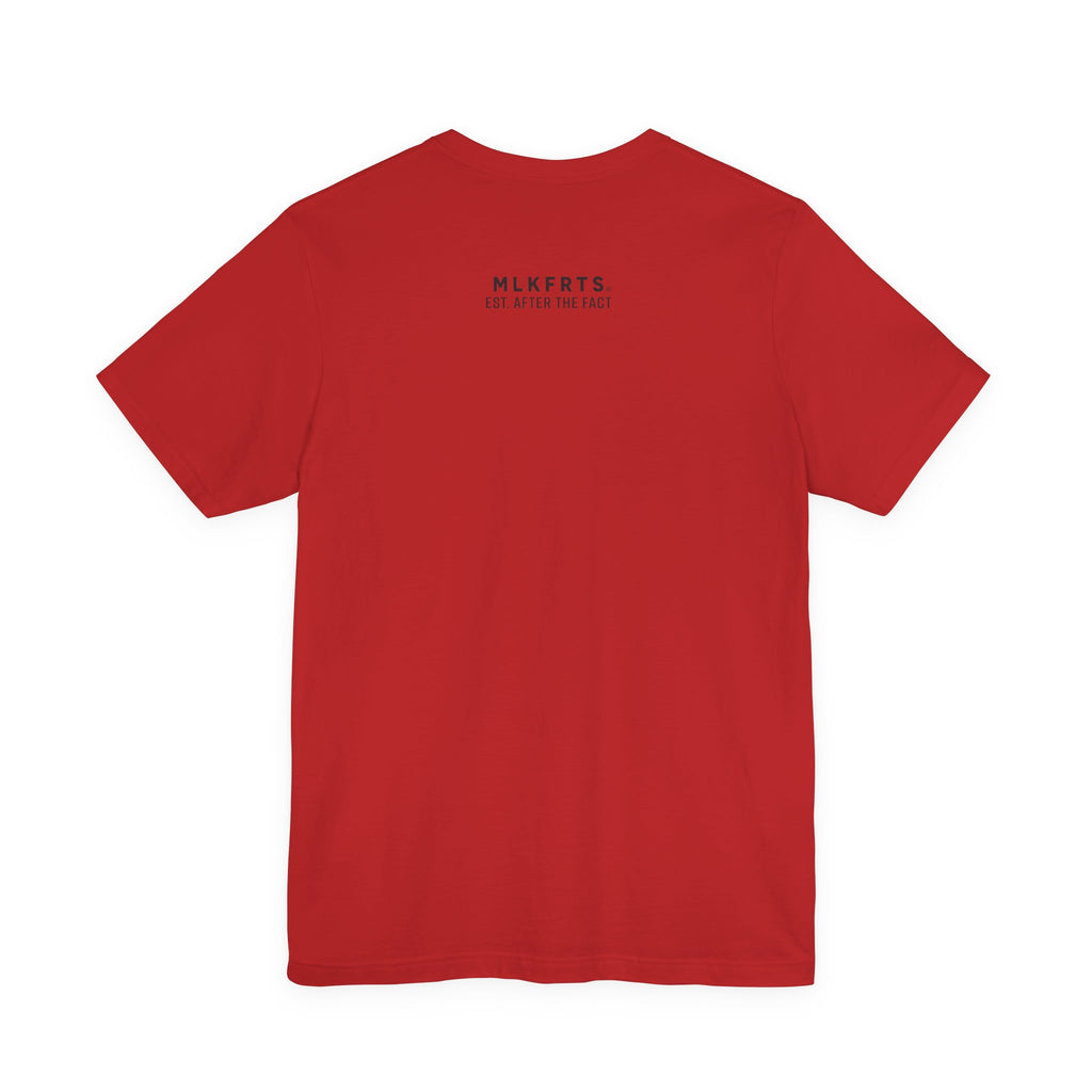 Red t-shirt, back view with small MLKFRTS letterhead text