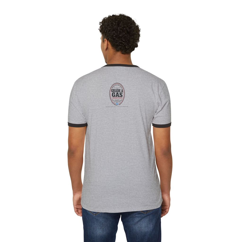 Model wearing the Heather Grey/Black ringer tee, back view with a small oval seal on the upper back